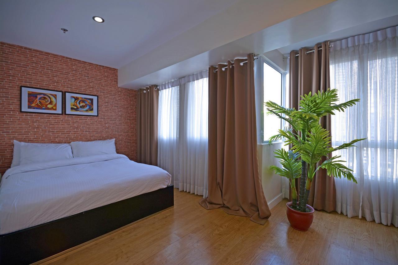 Victoria Soho Suites Манила Экстерьер фото